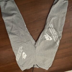 Nike Gray Tapered Sweatpants with Graphic Design